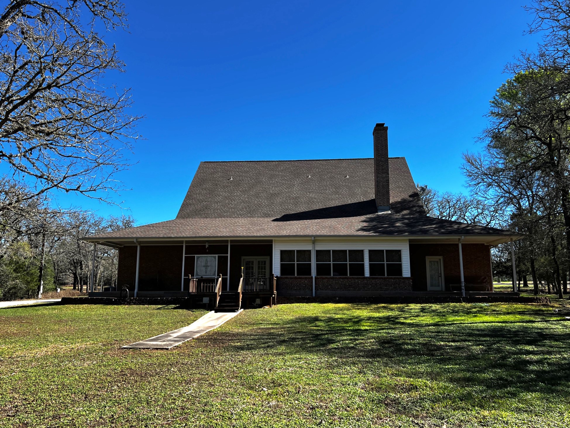 730 Panorama Road La Grange, TX 78945 - Photo 32 of 37 a front view of a house with a garden