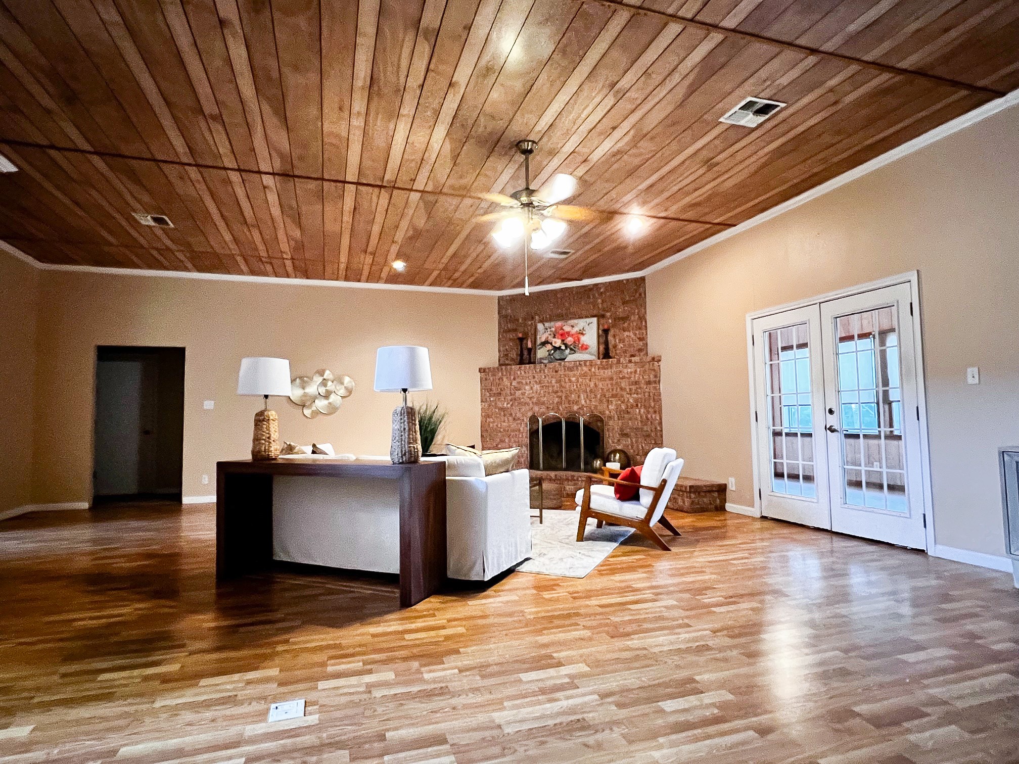 730 Panorama Road La Grange, TX 78945 - Photo 9 of 37 a view of a room with furniture and wooden floor