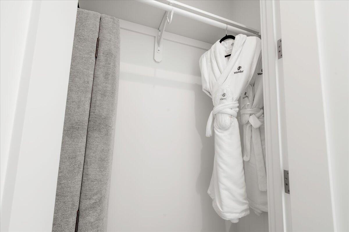 810 39th Street, Unit GULF Marathon, FL 33050 - Photo 18 of 113 a view of walk in closet with clothes