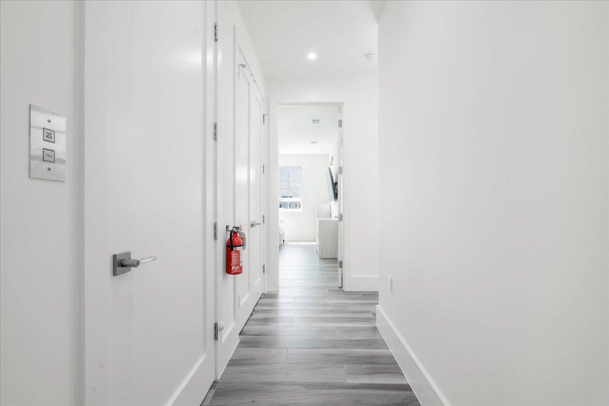 810 39th Street, Unit GULF Marathon, FL 33050 - Photo 22 of 113 a view of a hallway with wooden floor and stairs