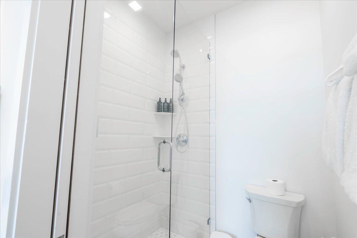 810 39th Street, Unit GULF Marathon, FL 33050 - Photo 29 of 113 a bathroom with a shower and toilet