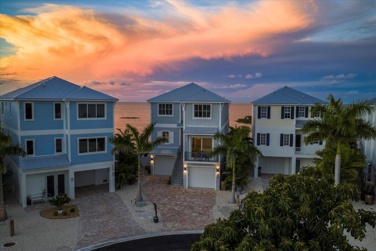 810 39th Street, Unit GULF Marathon, FL 33050 - Photo 3 of 113 a front view of a house with a yard