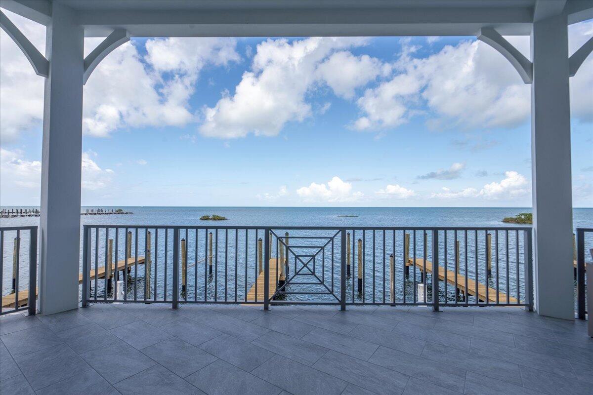 810 39th Street, Unit GULF Marathon, FL 33050 - Photo 55 of 113 a view of a balcony with wooden floor