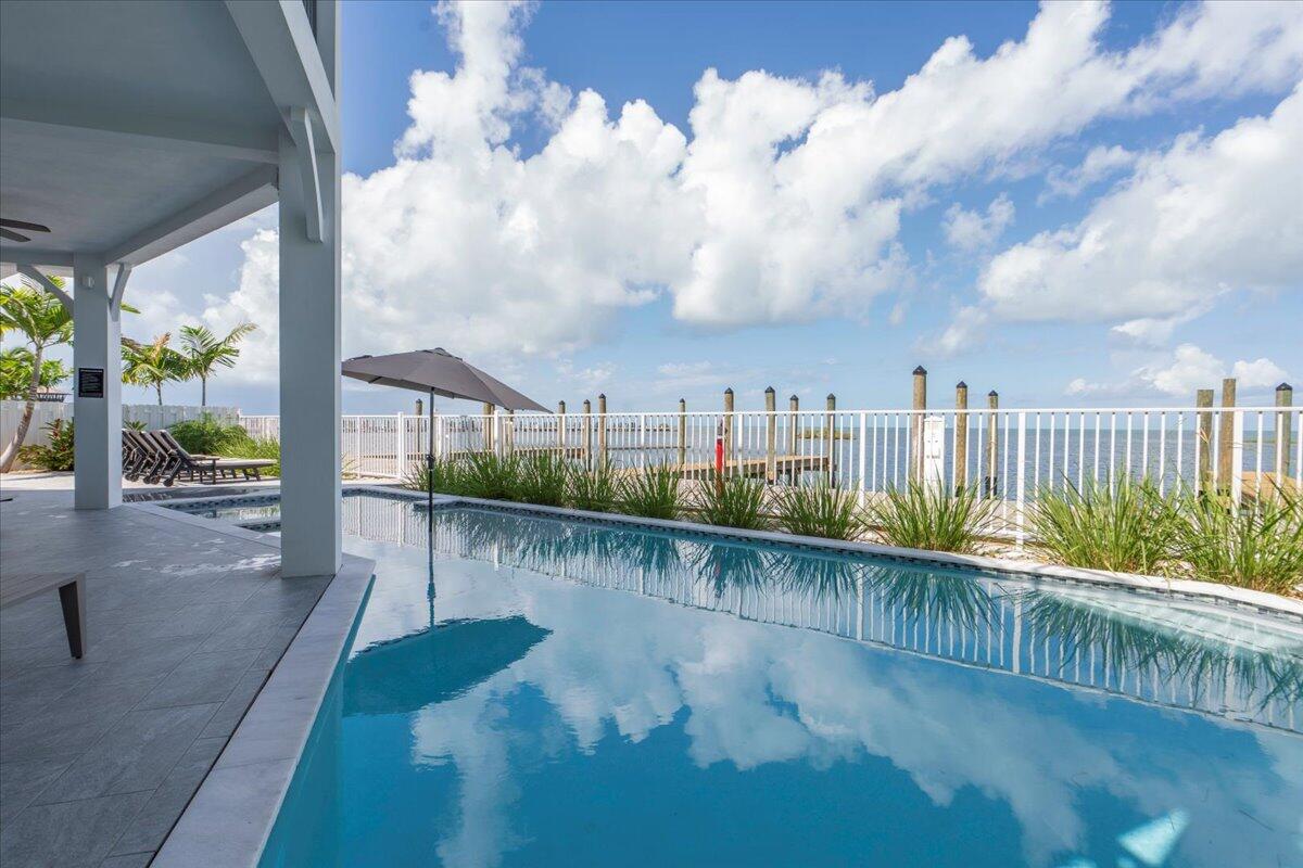 810 39th Street, Unit GULF Marathon, FL 33050 - Photo 62 of 113 a view of a city from a balcony