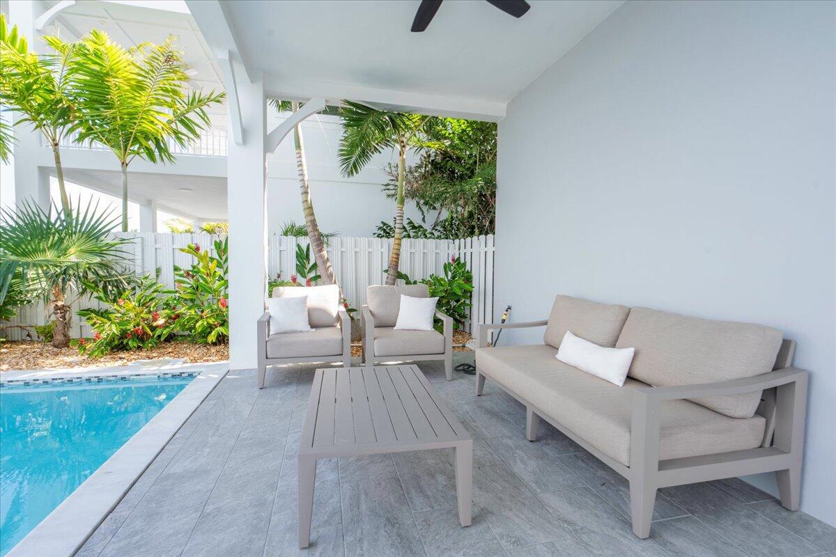 810 39th Street, Unit GULF Marathon, FL 33050 - Photo 63 of 113 a living room with patio furniture and a garden