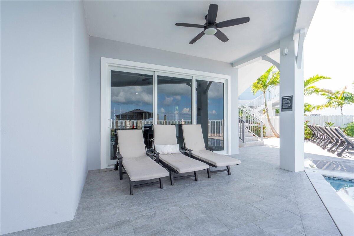 810 39th Street, Unit GULF Marathon, FL 33050 - Photo 64 of 113 a living room with furniture and a window