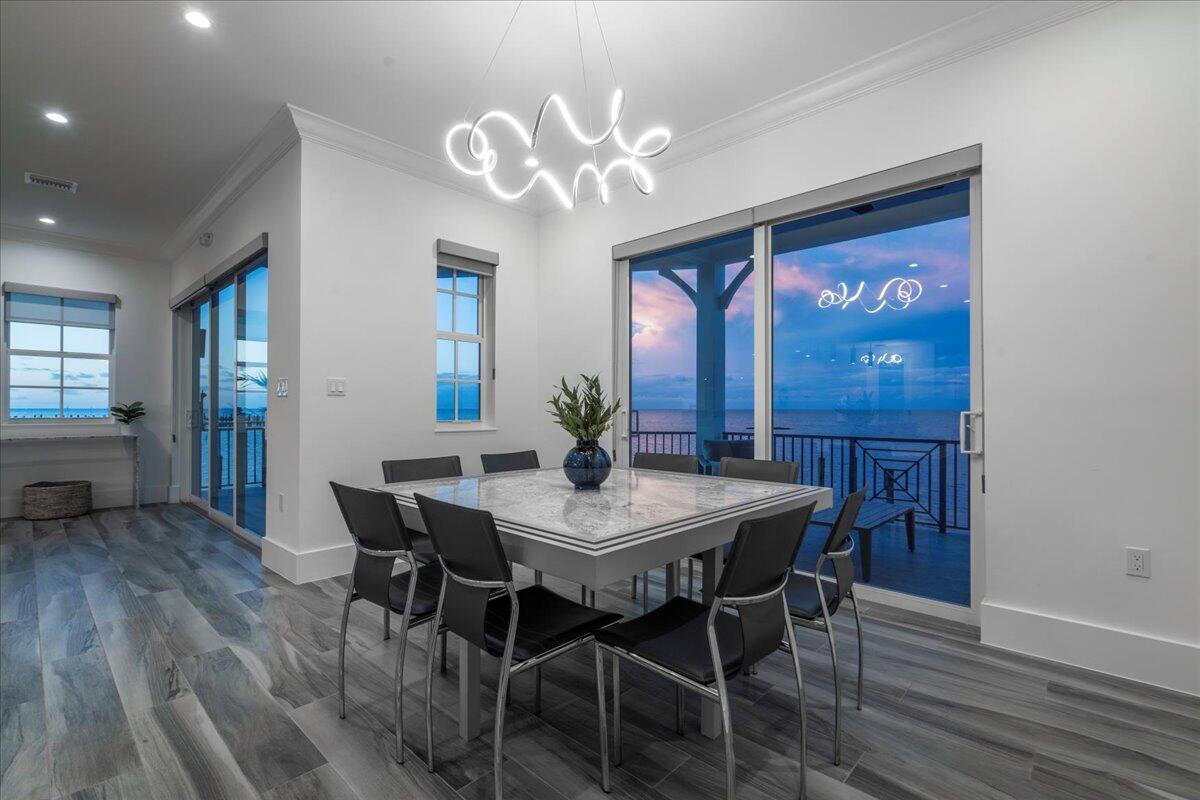 810 39th Street, Unit GULF Marathon, FL 33050 - Photo 79 of 113 a view of a dining room with furniture and wooden floor