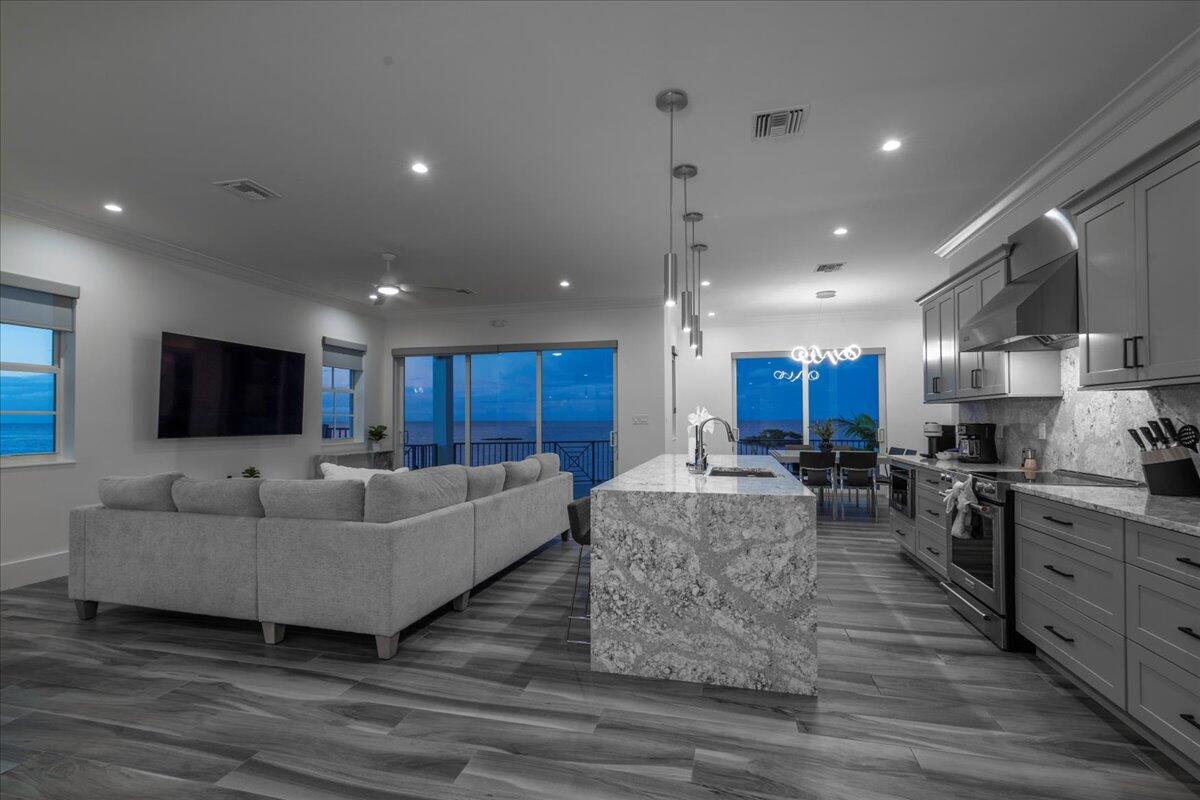 810 39th Street, Unit GULF Marathon, FL 33050 - Photo 80 of 113 a living room with furniture and a flat screen tv