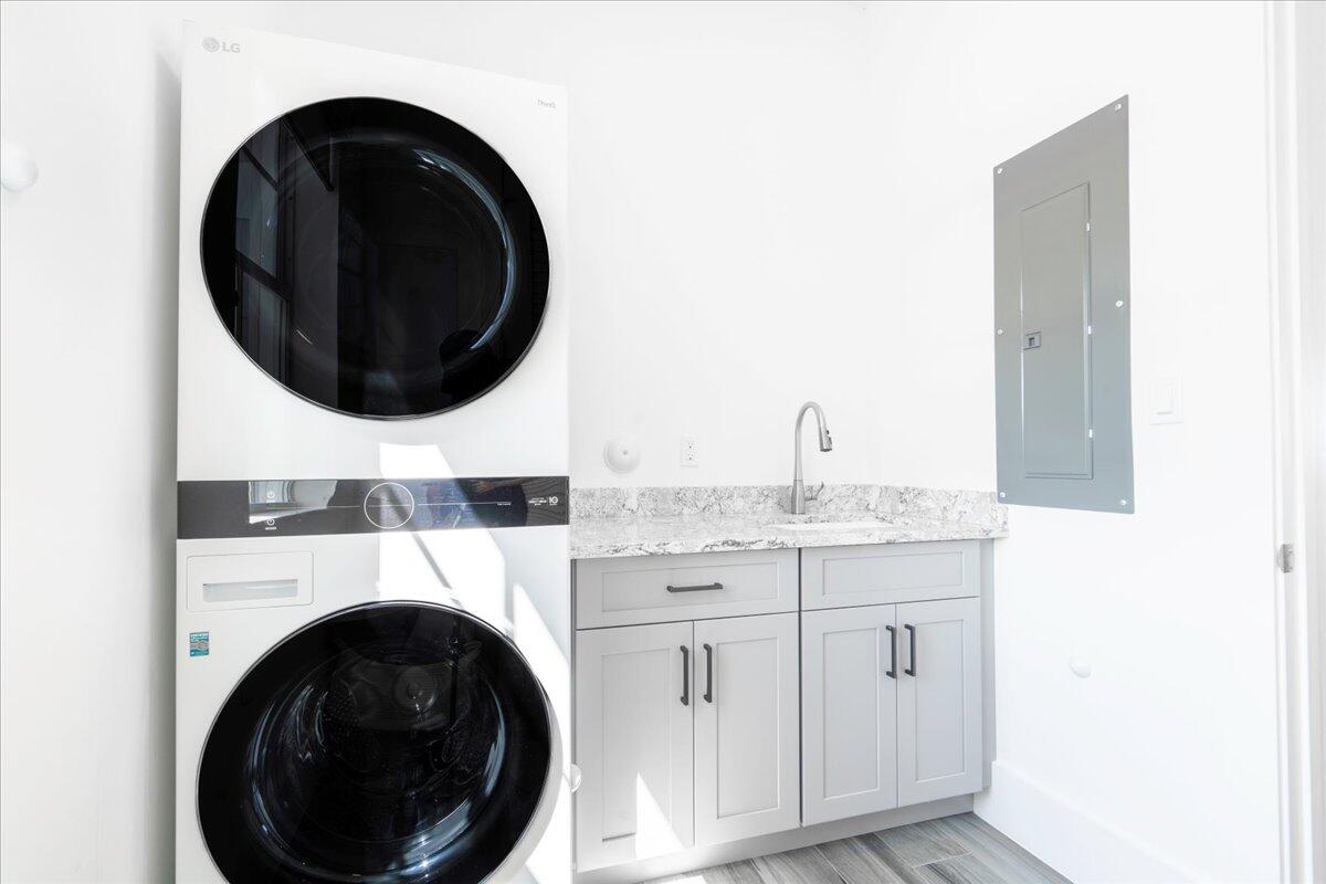 810 39th Street, Unit GULF Marathon, FL 33050 - Photo 8 of 113 a bathroom with a granite countertop toilet and a sink