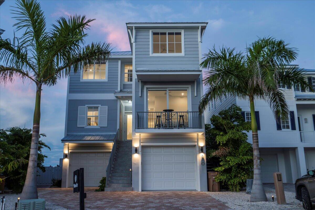 810 39th Street, Unit GULF Marathon, FL 33050 - Photo 82 of 113 a front view of house with yard along with palm trees