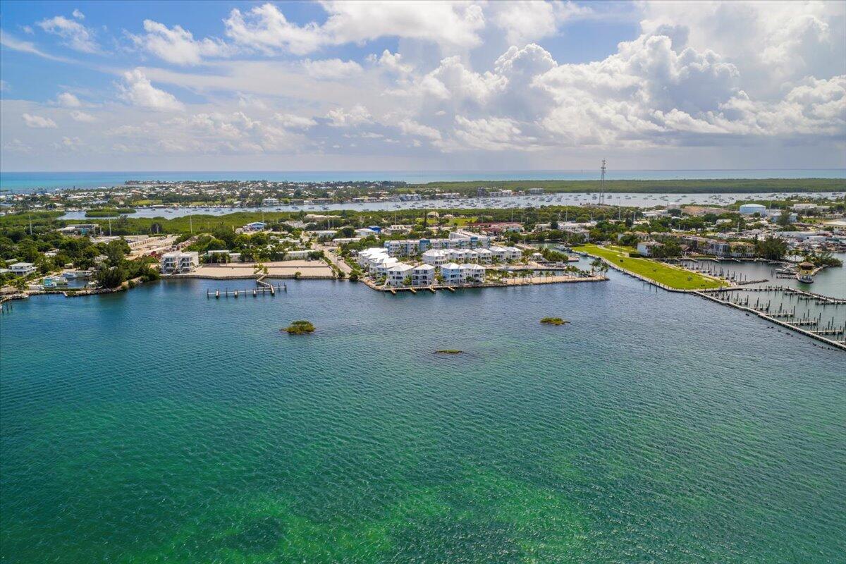 810 39th Street, Unit GULF Marathon, FL 33050 - Photo 94 of 113 a view of a city with lawn chairs