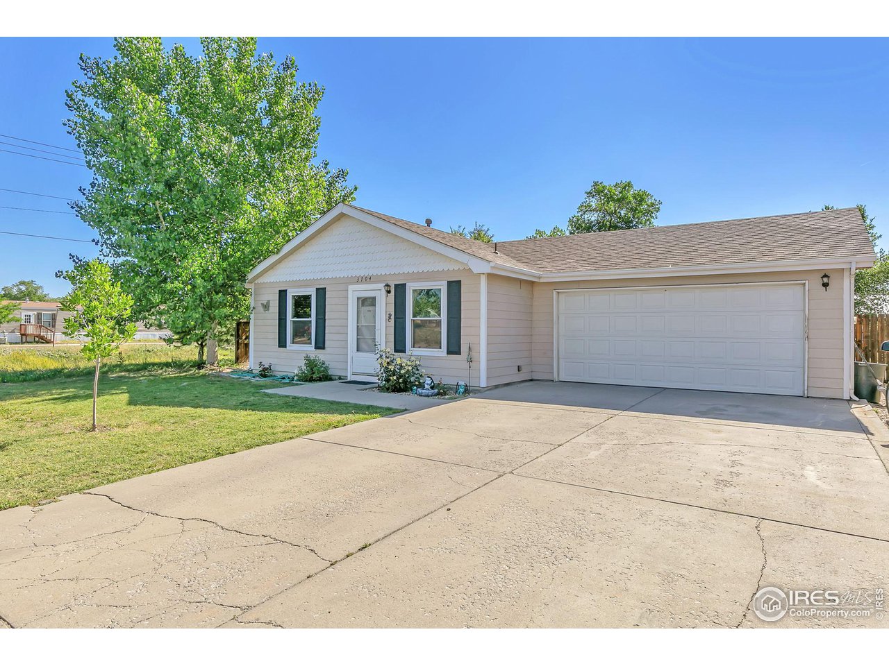 3704 Riverside Parkway Evans, CO 80620 - Photo 3 of 25 You'll love the oversized 2 car garage