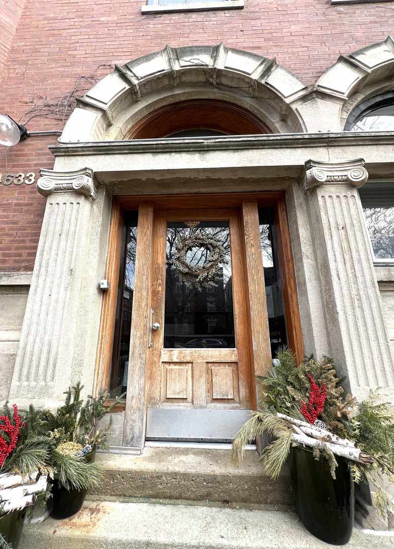 4633 North Racine Avenue, Unit GN Chicago, IL 60640 - Photo 23 of 25 a view of a entryway door of the house