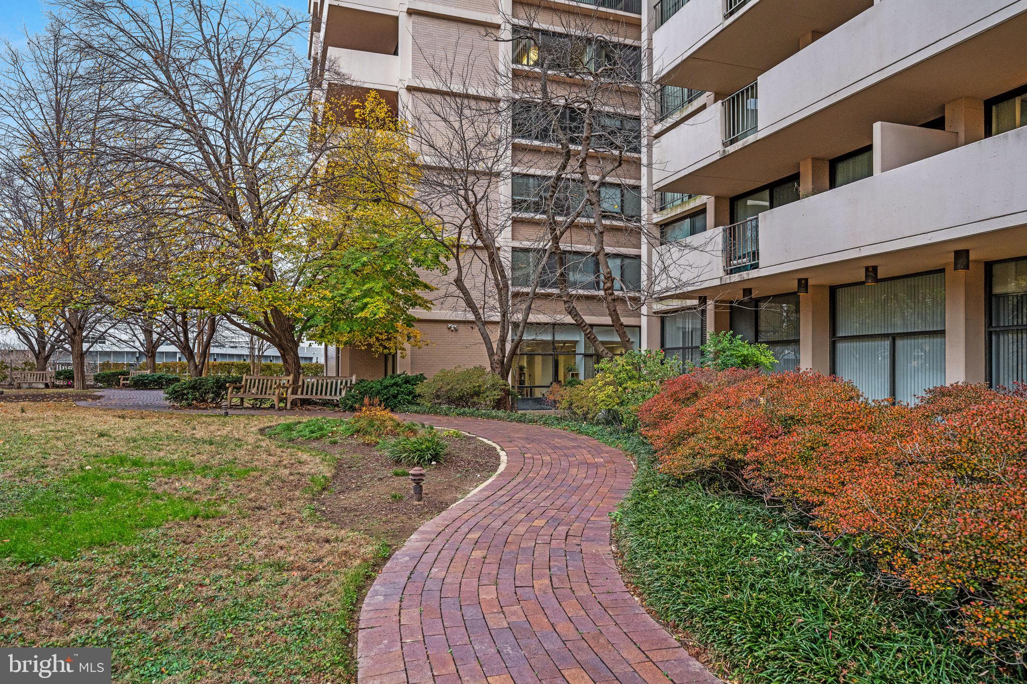 4141 North Henderson Road, Unit 702 Arlington, VA 22203 - Photo 41 of 69 a view of a building with a yard