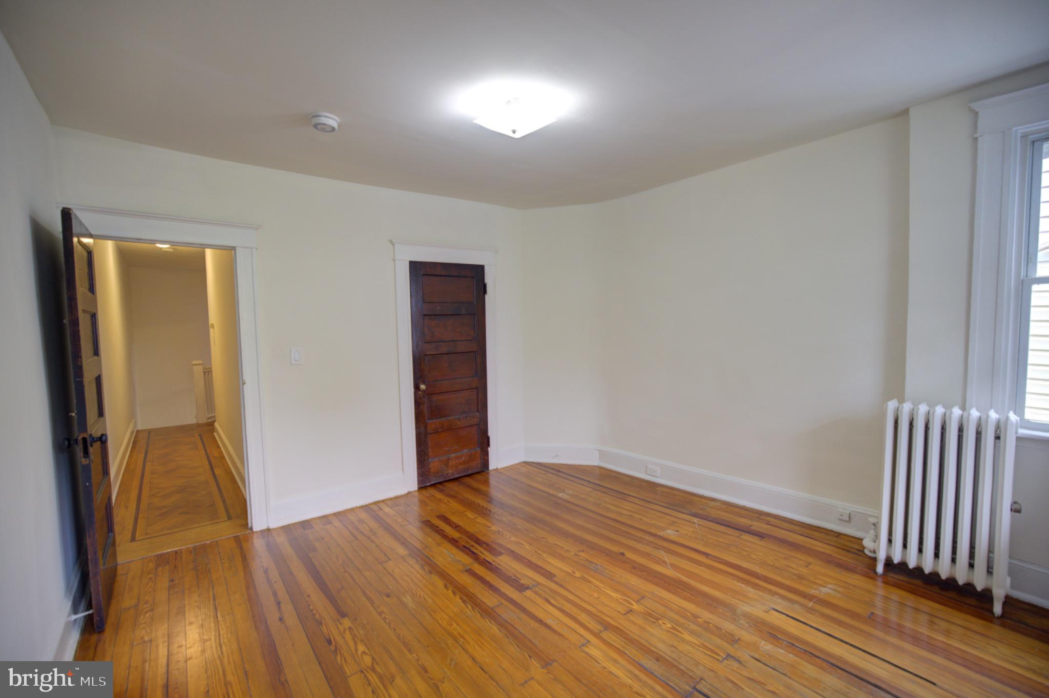 608 East 33rd Street Baltimore, MD 21218 - Photo 13 of 17 Rear bedroom