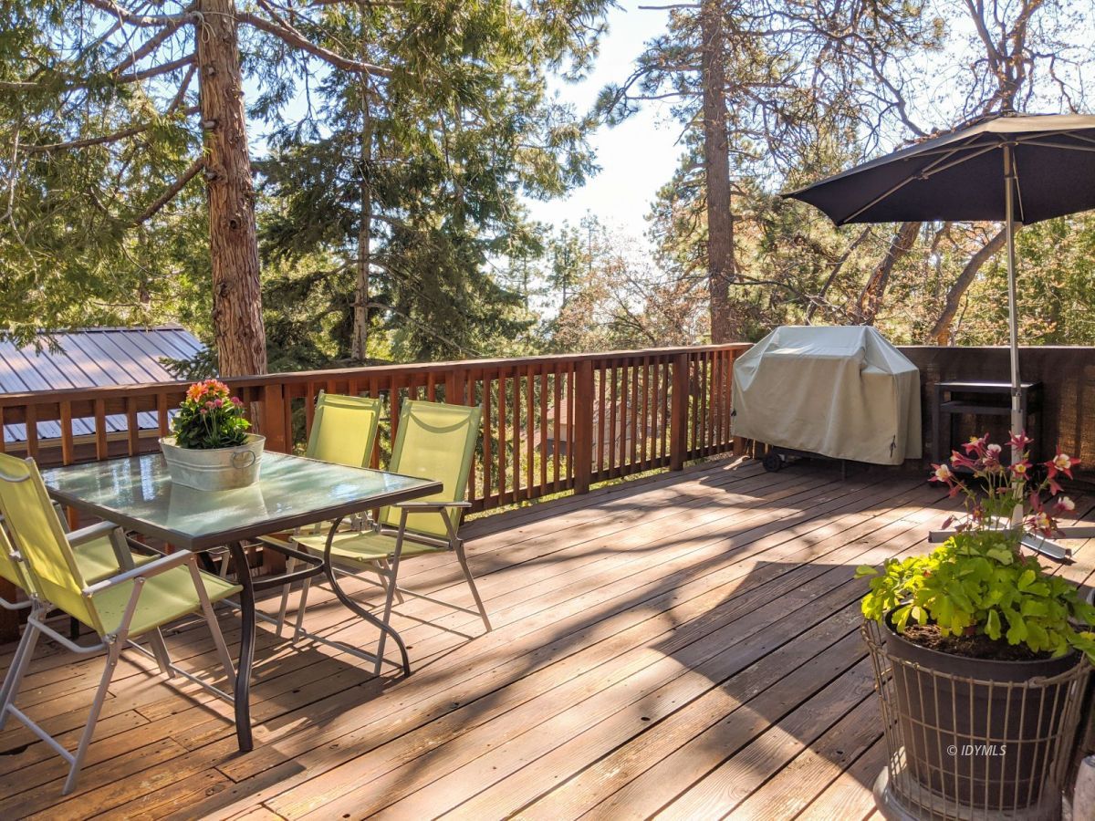 26523 Pine Avenue Idyllwild, CA 92549 - Photo 13 of 56 a view of a table and chairs in patio