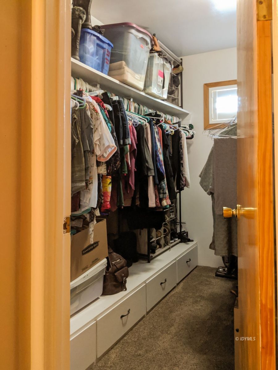 26523 Pine Avenue Idyllwild, CA 92549 - Photo 22 of 56 a view of walk in closet with clothes and shoes
