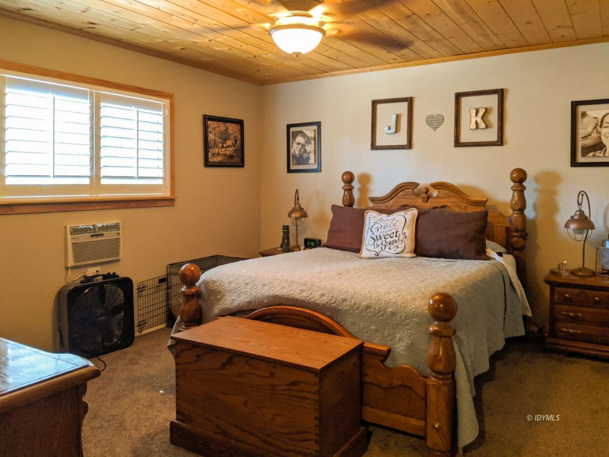 26523 Pine Avenue Idyllwild, CA 92549 - Photo 24 of 56 a bedroom with a bed and window