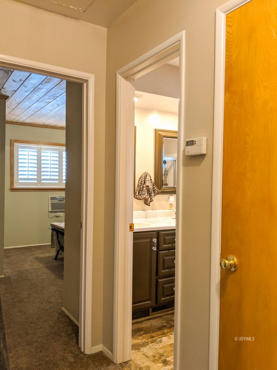 26523 Pine Avenue Idyllwild, CA 92549 - Photo 27 of 56 a bathroom with a sink and mirror