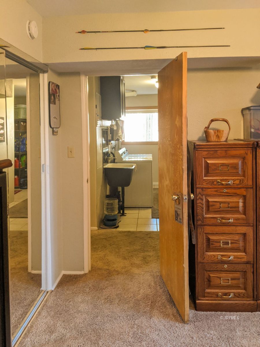 26523 Pine Avenue Idyllwild, CA 92549 - Photo 40 of 56 a view of a hallway with bathroom and a shower