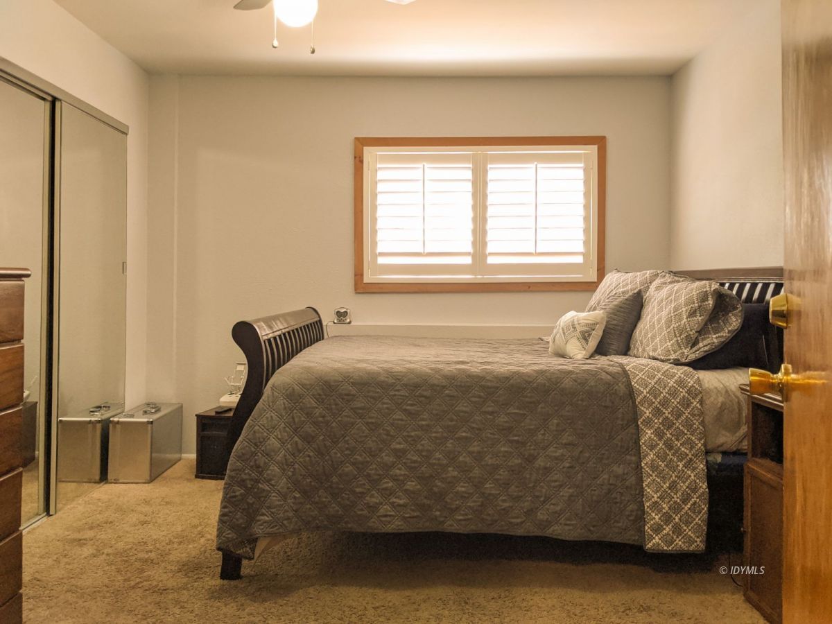 26523 Pine Avenue Idyllwild, CA 92549 - Photo 45 of 56 a bedroom with a bed and a window