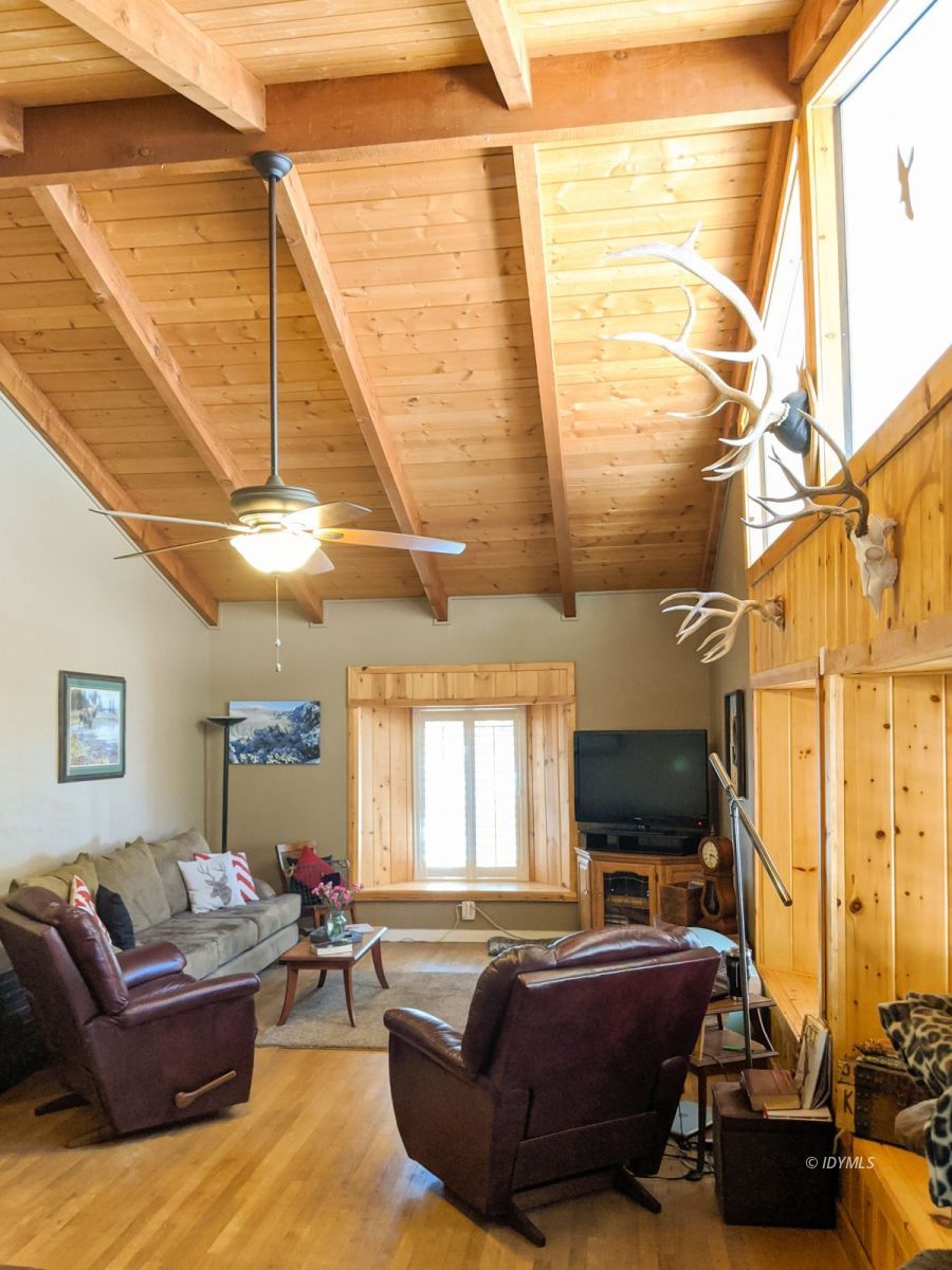 26523 Pine Avenue Idyllwild, CA 92549 - Photo 5 of 56 a living room with furniture a flat screen tv and a window