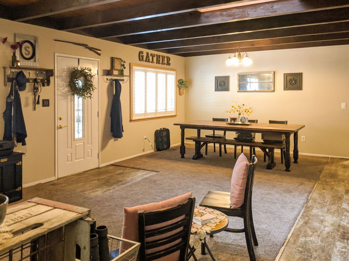 26523 Pine Avenue Idyllwild, CA 92549 - Photo 8 of 56 a view of a dining room with furniture