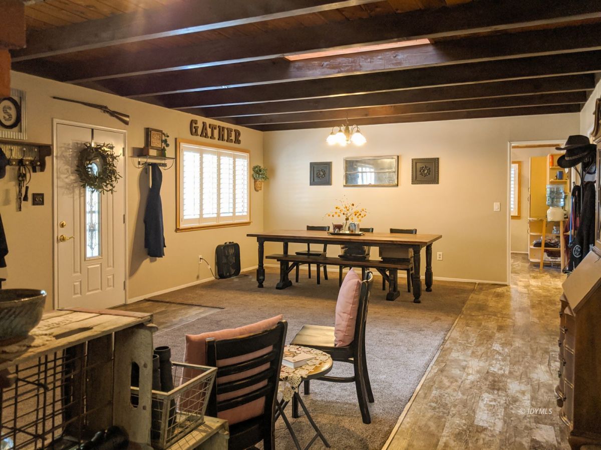 26523 Pine Avenue Idyllwild, CA 92549 - Photo 9 of 56 a view of a dining room with furniture