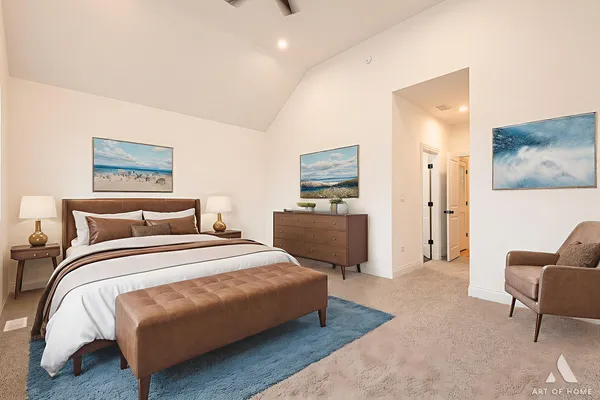 a bedroom with bed couches and a flat tv screen