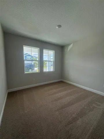 an empty room with an entryway