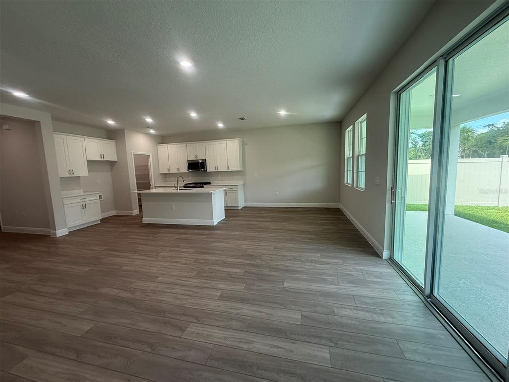 12132 Cattleside Drive Riverview, FL 33579 - Photo 28 of 31 a view of a kitchen with a sink and a stove