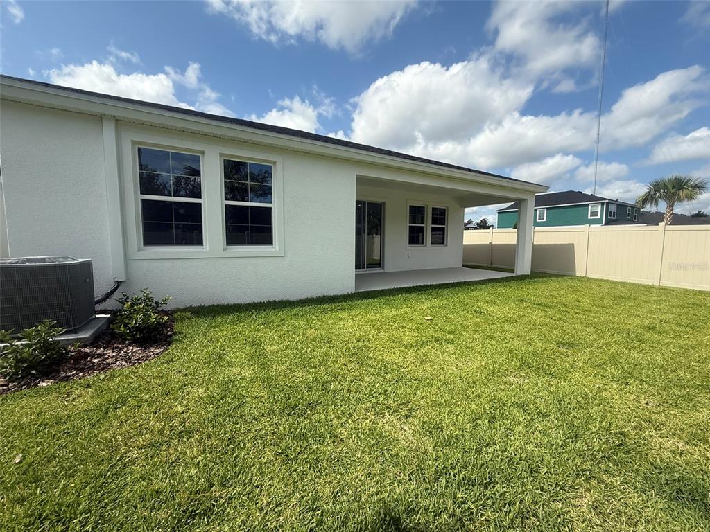 12132 Cattleside Drive Riverview, FL 33579 - Photo 30 of 31 a view of a house with backyard and garden