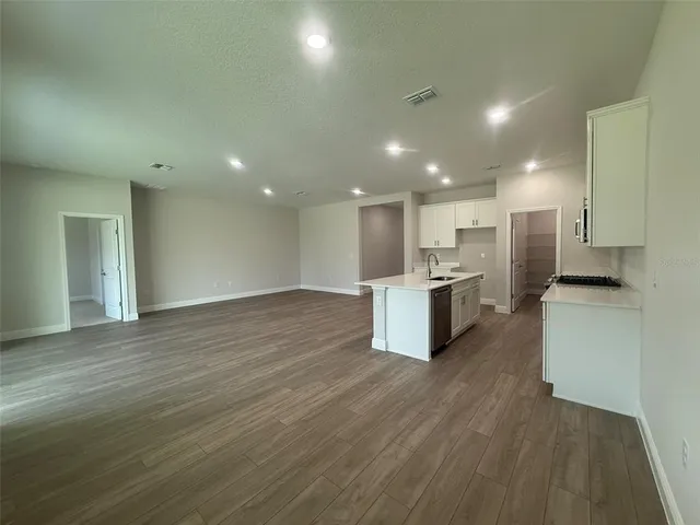 a view of a room with racks on the wall