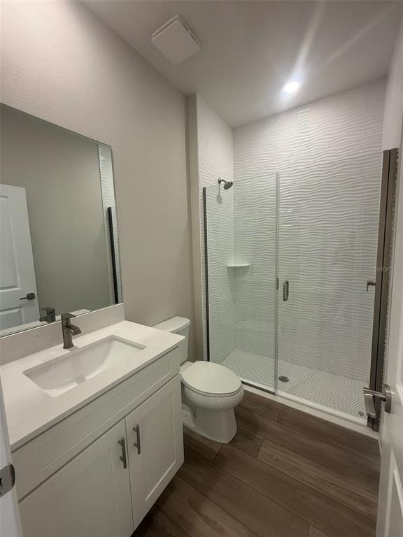 12132 Cattleside Drive Riverview, FL 33579 - Photo 10 of 31 a bathroom with a double vanity sink toilet and shower