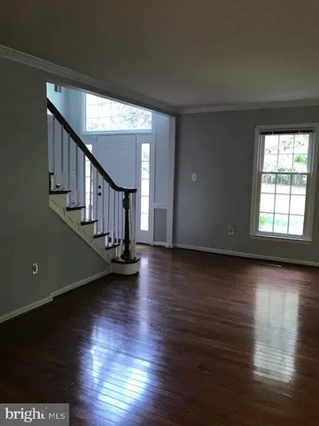 a kitchen with stainless steel appliances a sink and stove