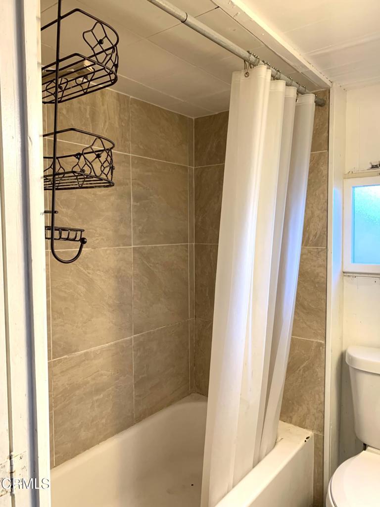 3900 East Main Street, Unit 62 Ventura, CA 93003 - Photo 6 of 11 a bathroom with a shower and a toilet