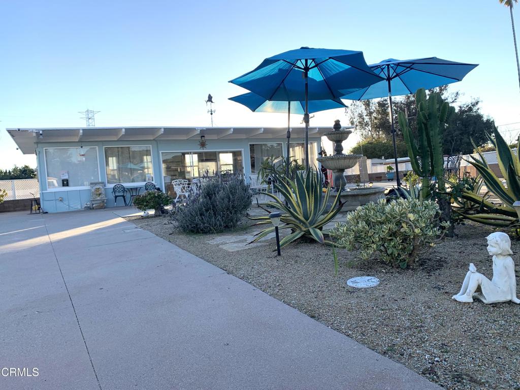 3900 East Main Street, Unit 62 Ventura, CA 93003 - Photo 8 of 11 a view of a house with backyard and sitting area