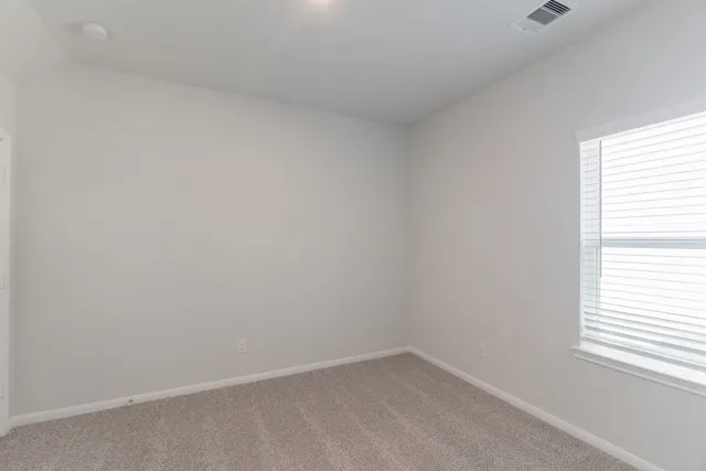 an empty room with closet