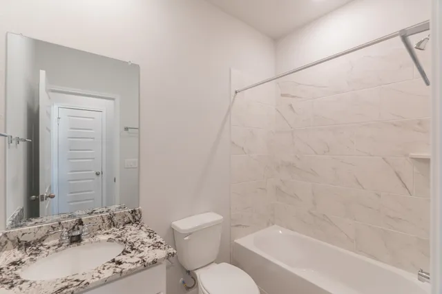 a view of entryway with wooden floor and stairs