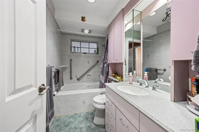 a bed room with a bed and a dresser