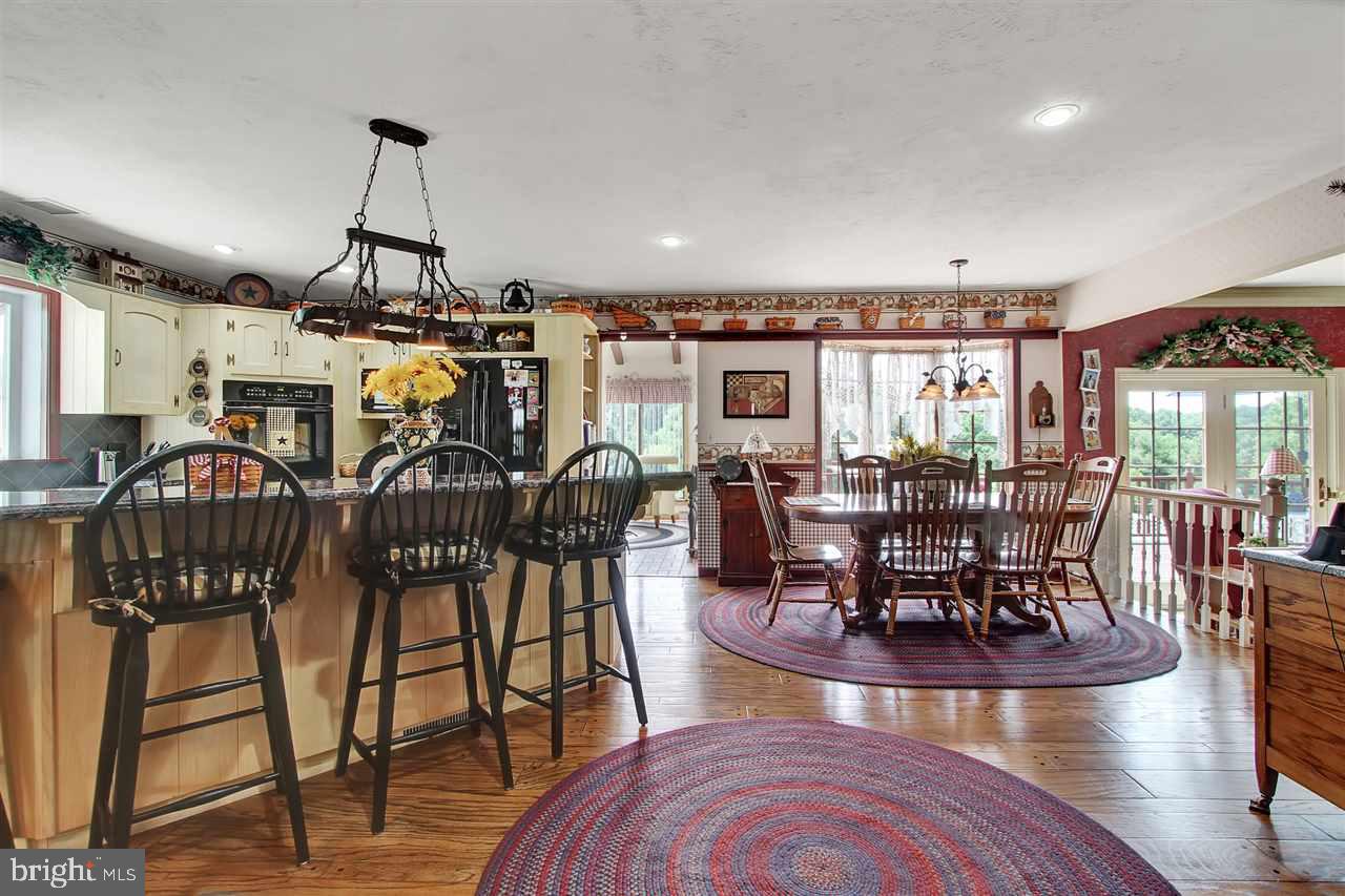 5650 Lischeys Church Road Spring Grove, PA 17362 - Photo 14 of 36 a view of a dining room with furniture