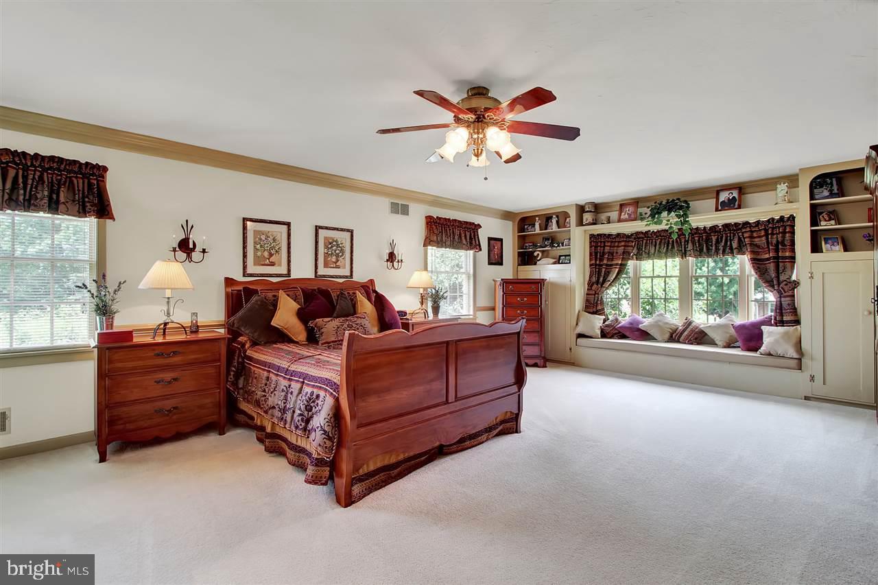 5650 Lischeys Church Road Spring Grove, PA 17362 - Photo 18 of 36 a living room with furniture and a chandelier
