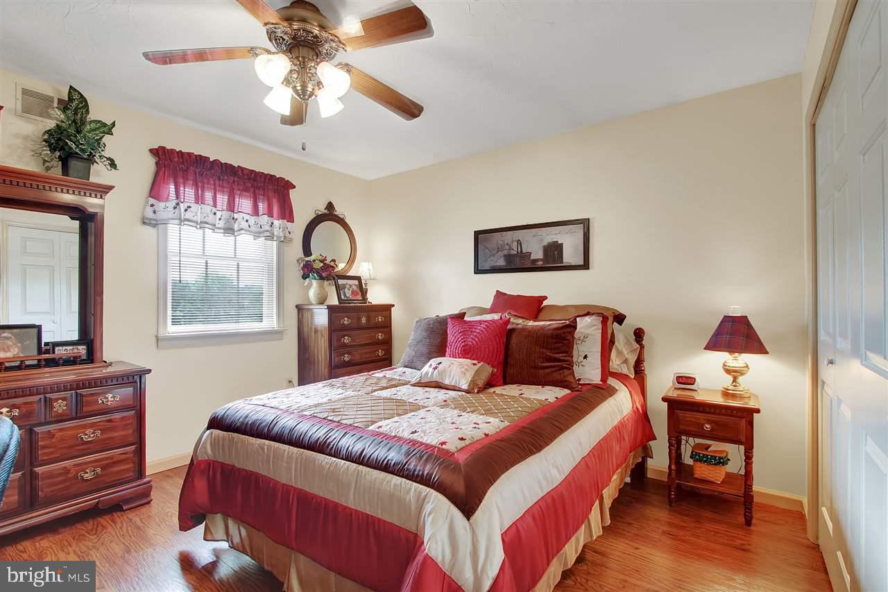 5650 Lischeys Church Road Spring Grove, PA 17362 - Photo 22 of 36 a bed room with a bed and a dresser