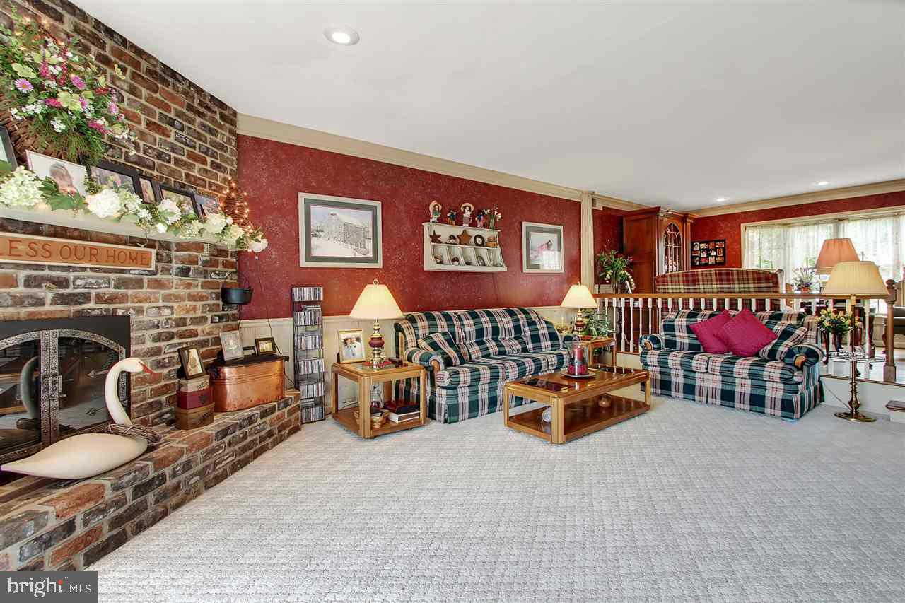 5650 Lischeys Church Road Spring Grove, PA 17362 - Photo 7 of 36 a bedroom with furniture and a lamp