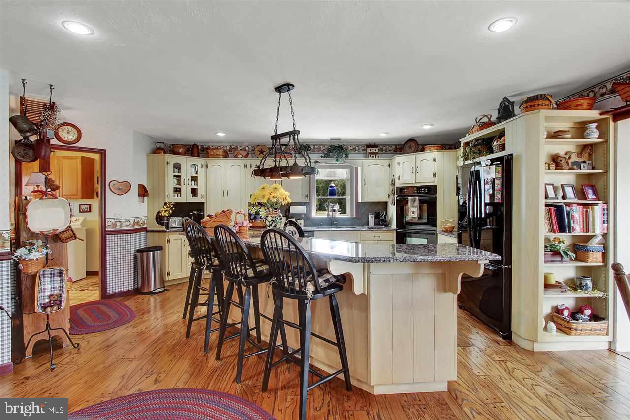5650 Lischeys Church Road Spring Grove, PA 17362 - Photo 10 of 36 a view of a kitchen and dining room