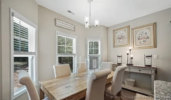 a workspace with furniture and window