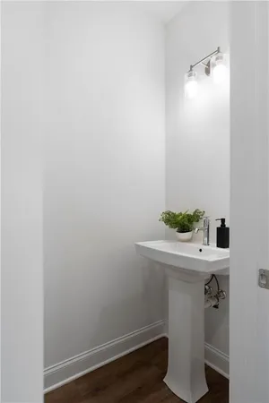 a bathroom with a sink and mirror