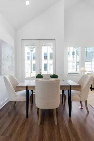 a view of a dining room with furniture window and outside view
