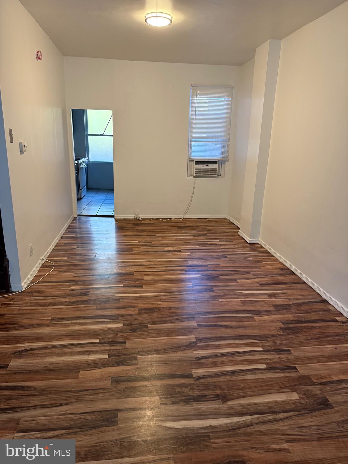 2856 Tulip Street Philadelphia, PA 19134 - Photo 3 of 13 a view of a room with wooden floor