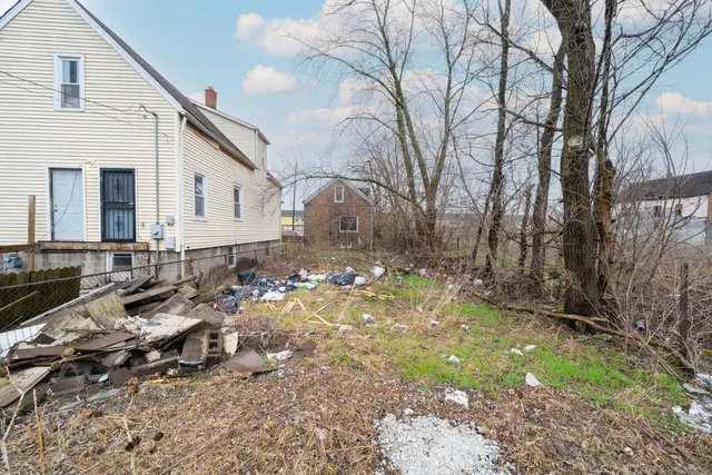 a backyard of a house with lots of green space